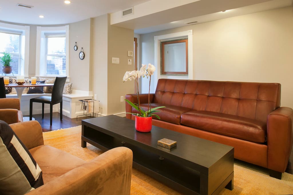 Room & Board leather sofa with full sleeper.