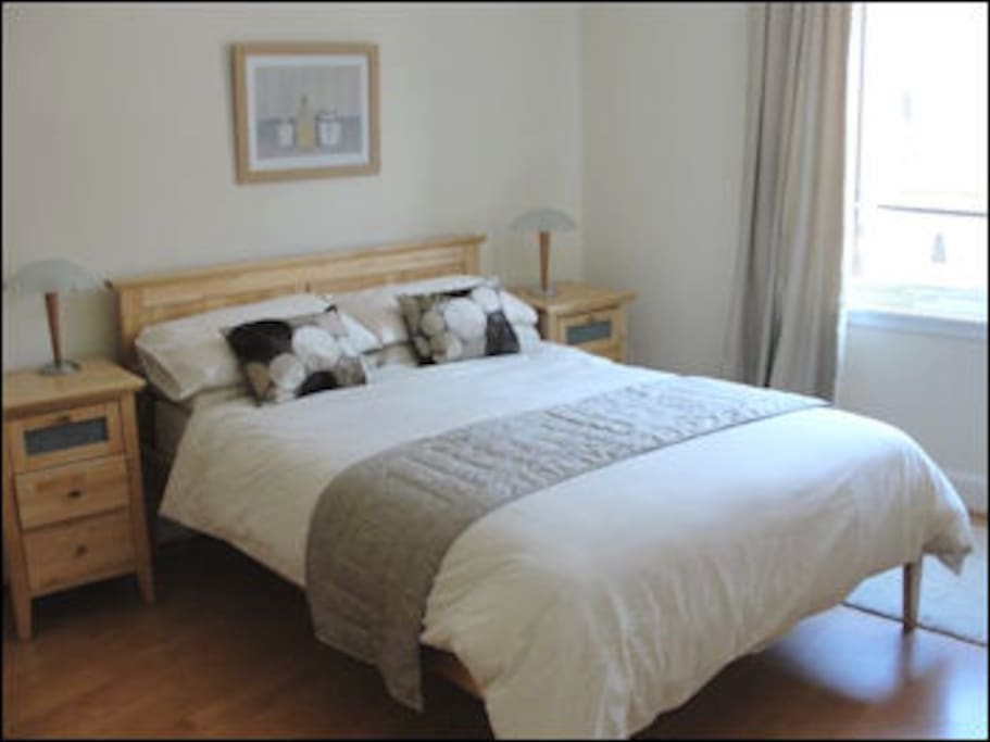 Bedroom with king size bed and an en suite shower room.