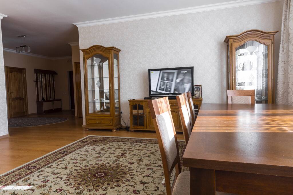A spacious hall with a large dining table