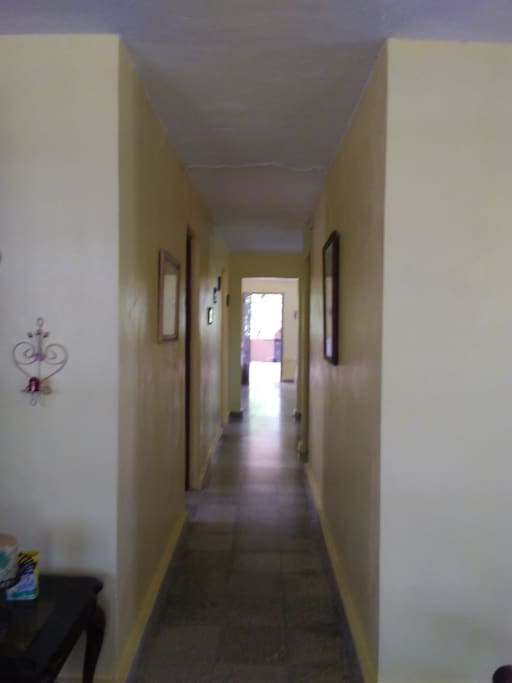 Hallway from Livingroom to rooms & Kitchen