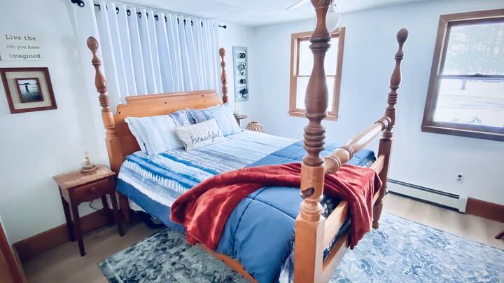First Floor Master Bedroom- “ The Lake Room”~ Queen size bed, toddler size mattress stored under bed. Closet with hangers and bureau with drawers for storage. Full length mirror. Faces lakeside of house.