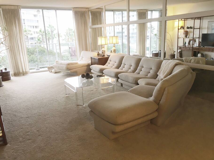 Spacious Living Room, floor to ceiling windows and wraparound balcony.