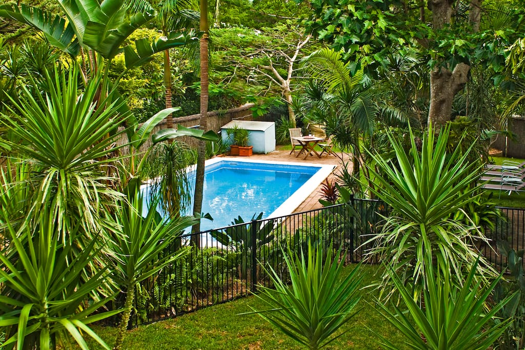 Lush gardens, heated pool