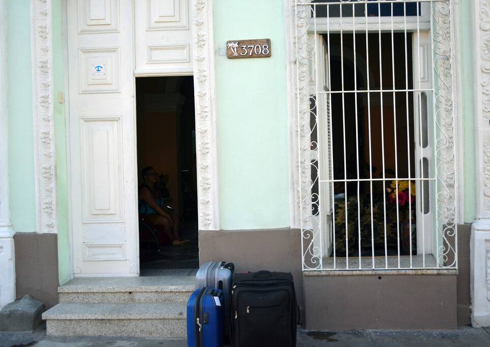 The facade of our hostel, colonial house, in a very quiet area and an unbeatable location. We are a family that opens doors to the friends of the world./La fachada de nuestro hostal, casa colonial, en una zona muy tranquila y de una ubicación inmejorable. Somos una familia que les abre las puertas a los amigos del mundo