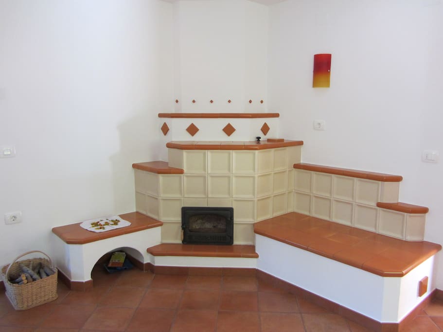 Fireplace in the dining room gives the house warm and romantic atmosphere.