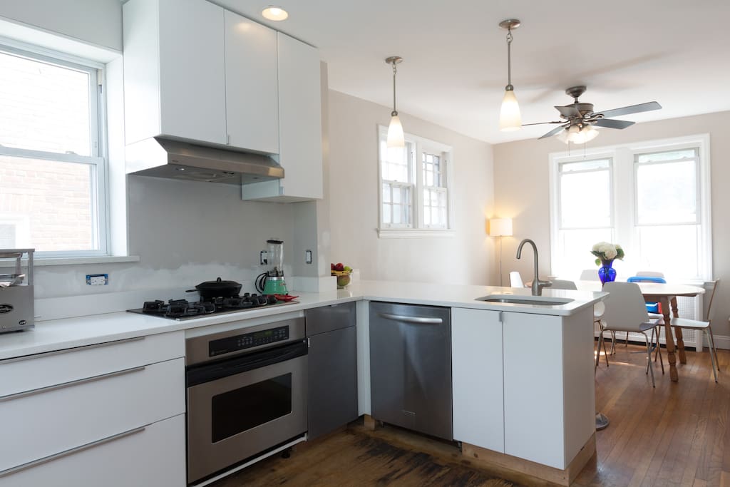 Stainless steel appliances and plenty of counter space make it a pleasure to work in this kitchen.
