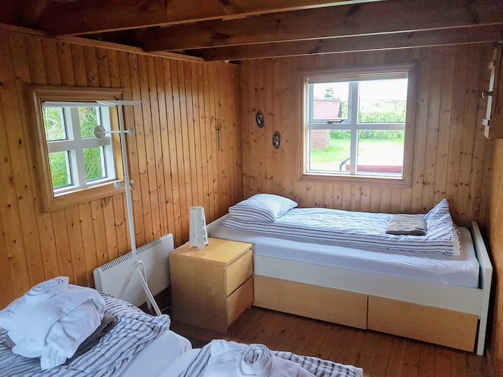 The main bedroom has 3 beds. This is the single bed.