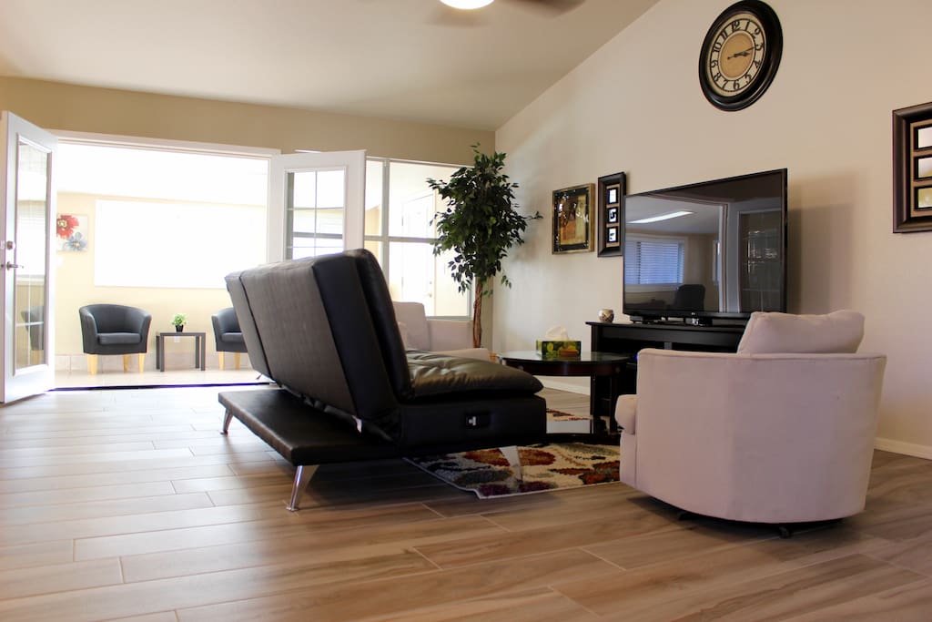 The family room is a part of the shared areas. Has a 65 inch LG HDTV complete with cable.