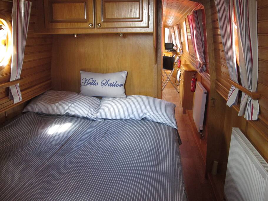 Full double bed, small wardrobe, over bed storage cupboard and under-bed storage drawers