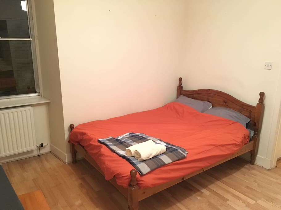 Bedroom; a room containing a bed.