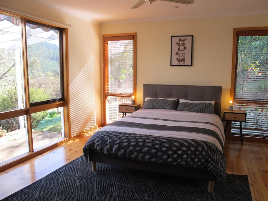 Sunny master bedroom with beautiful views