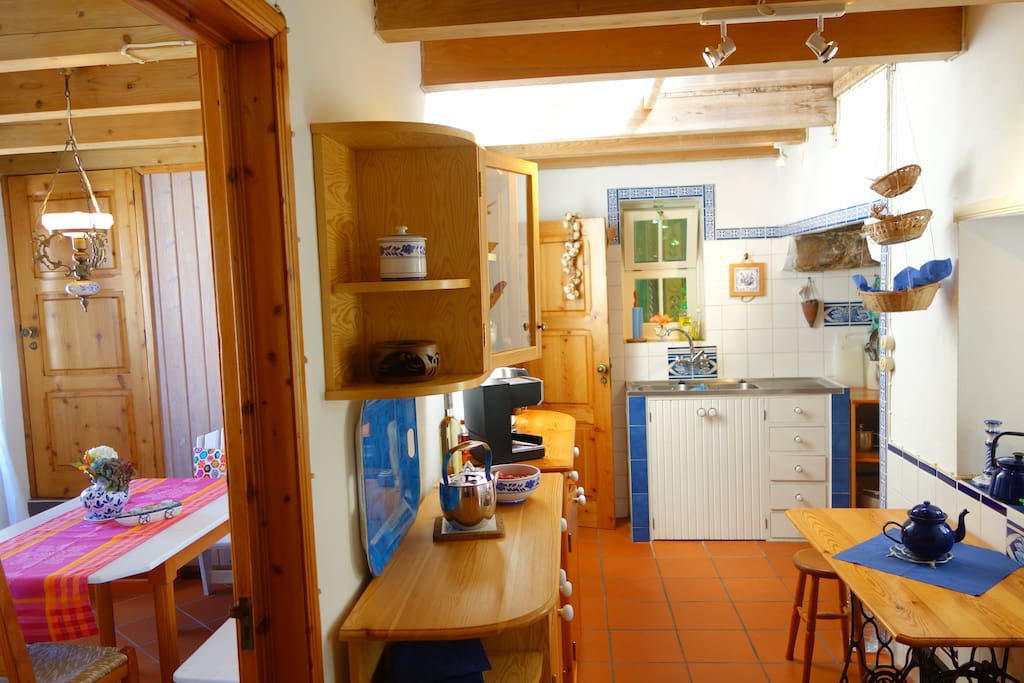 the (fully equipped) kitchen