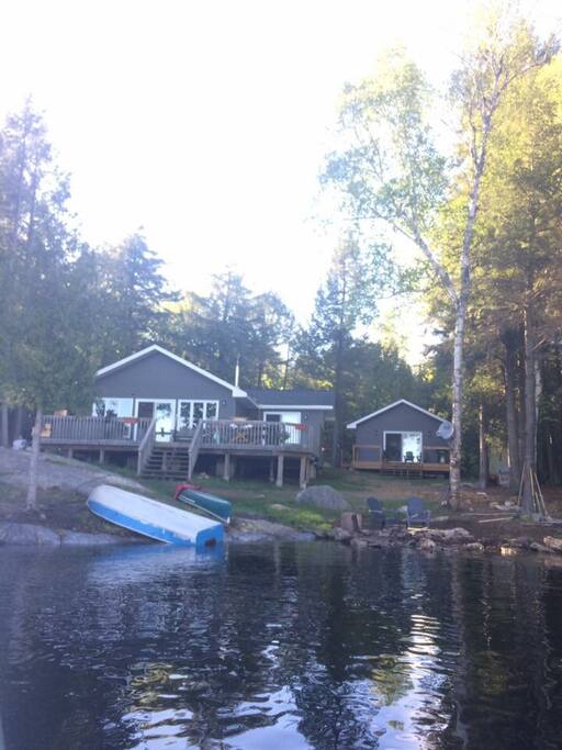 View of property from the lake. Large main cottage (1500 square feet with open concept living, dining and kitchen area) and guest cabin (480 square feet of luxury!)
112 feet of waterfront!