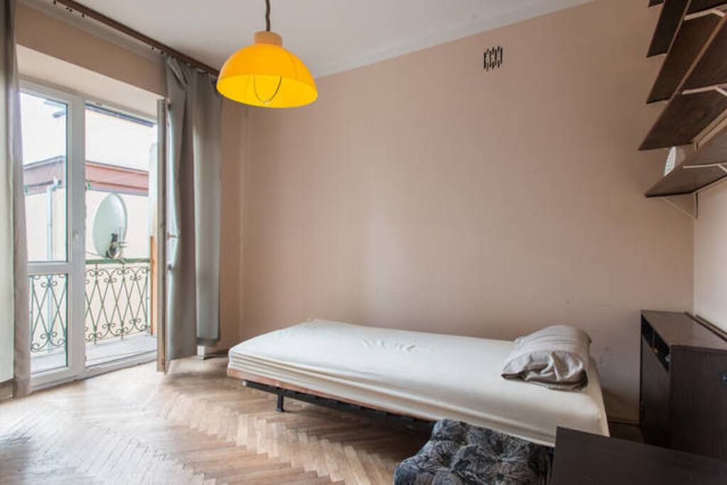 bedroom with balcony