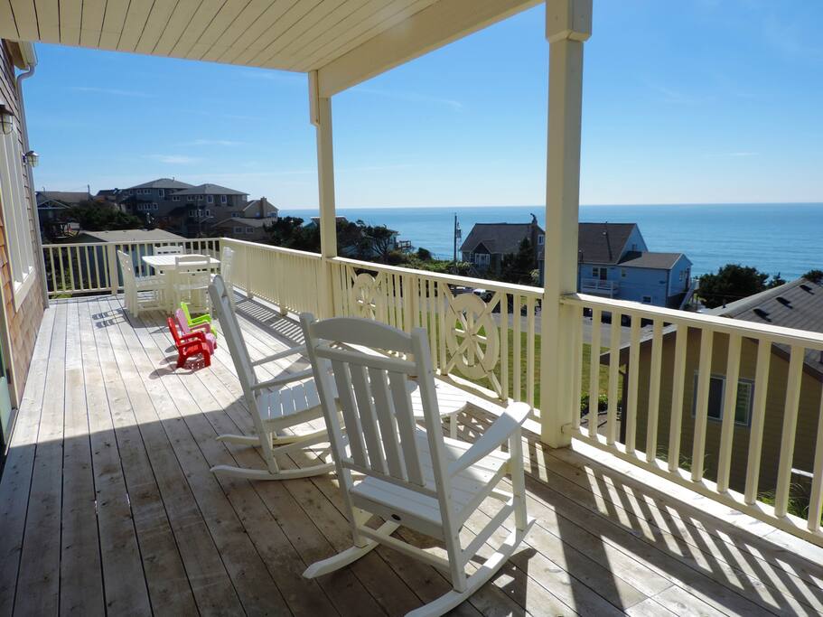 Wrap around balcony on the second floor wraps three sides of the home. There are also balconies on the ground and third floors to enjoy the views.