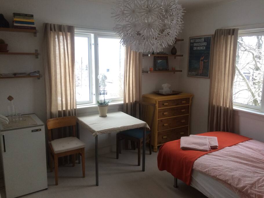 The room is big and have two windows
