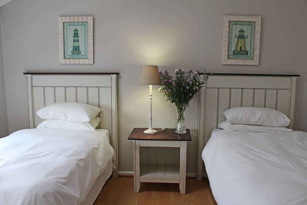 Second Bedroom • 2 Single Beds • Closet Space •