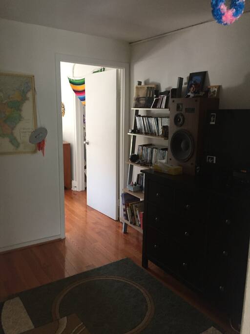 From inside the living room/second bedroom, one way into the main bedroom, but there is also another entrance.