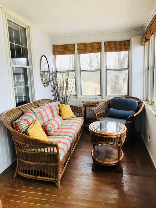 Relax and unwind on comfy wicker seating out on the front porch: catch a summer evening breeze, or sit sipping coffee in the warm morning sunshine.