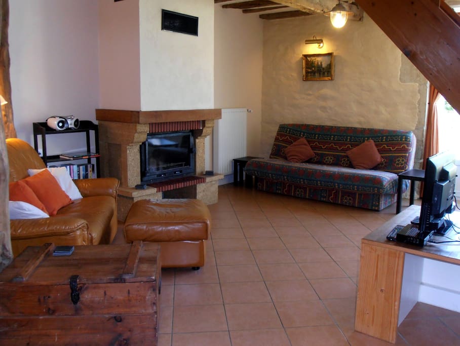 Lounge with enclosed wood-burner