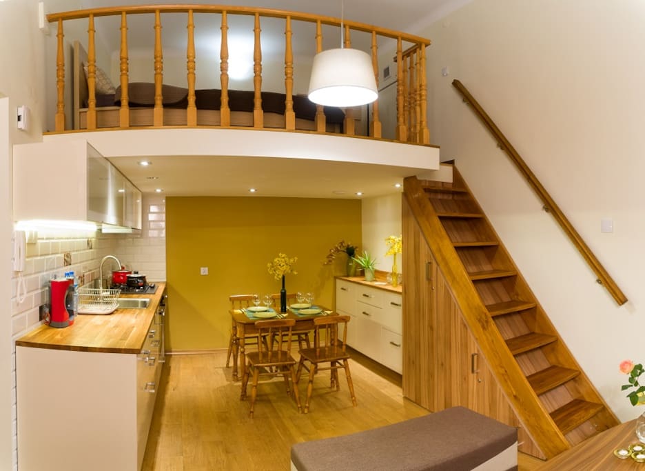 living room with the kitchen with view on the mezzanine
