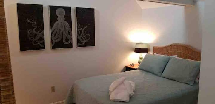 Third floor loft bedroom with double bed and en-suite bathroom
