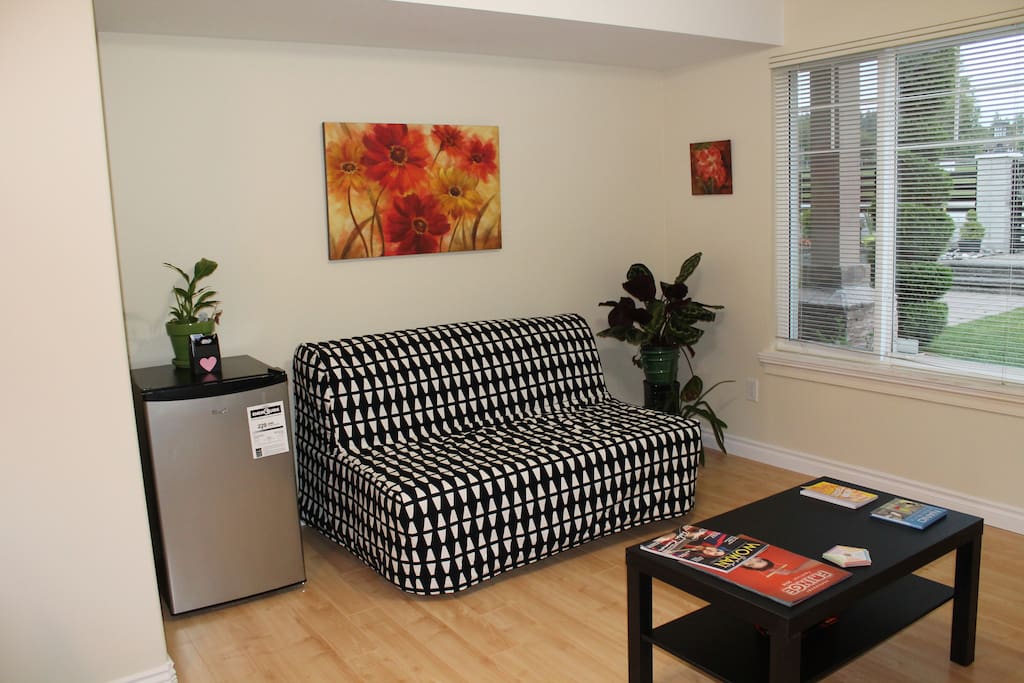 Savor your coffee and stare at the blossoms out in the garden or watch TV ! Sofa cum bed can accommodate one more person at an extra charge per night.