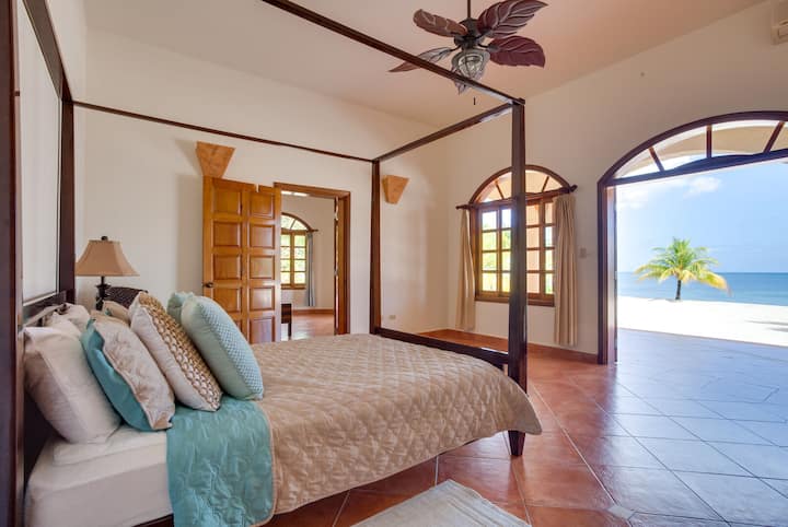 Downstairs suite 2 with queen bed and private bathroom. Adjoins Suite 3 if desired.
