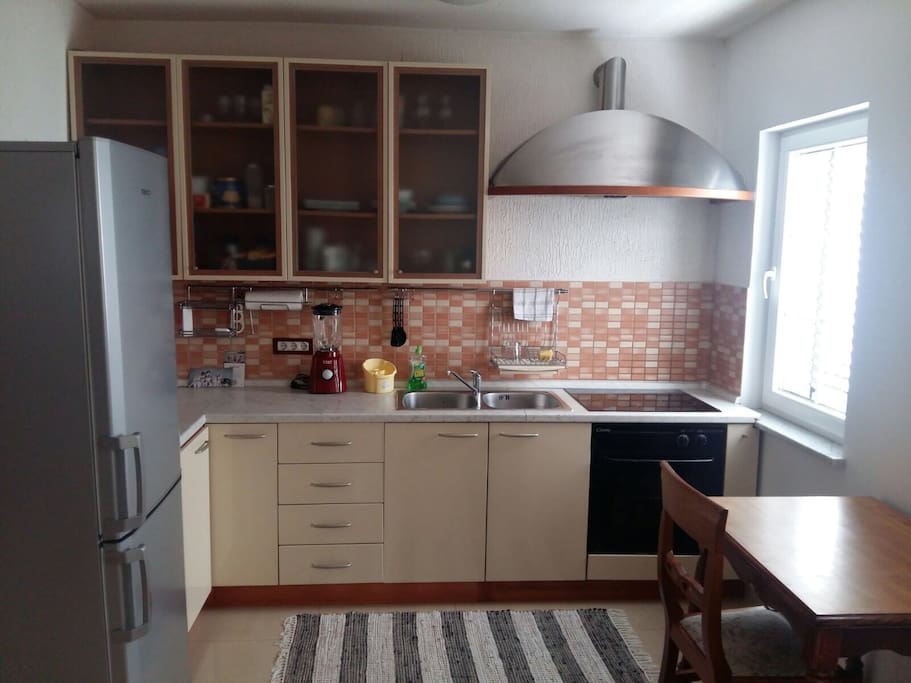 Kitchen is equipped with all necessary for holiday stay.