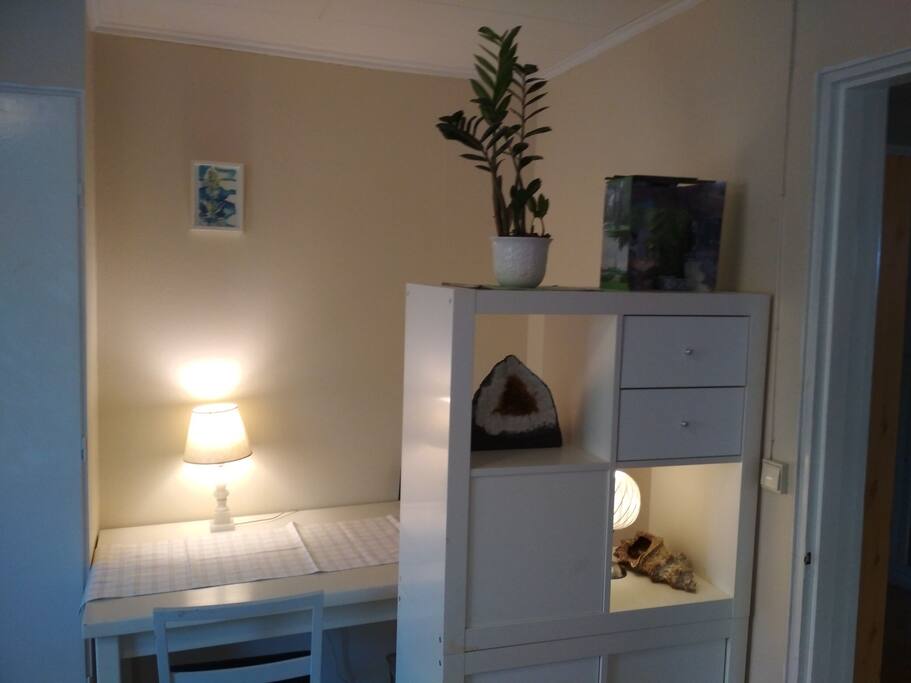 There is a desk in the room.