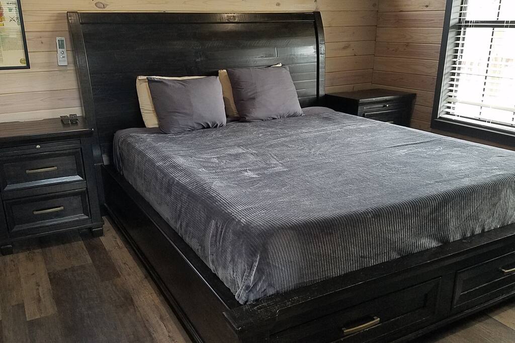 First bedroom: California King memory foam mattress.