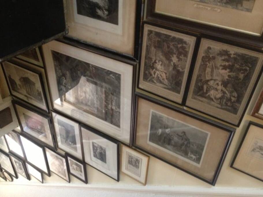 Our antique prints line the stairs