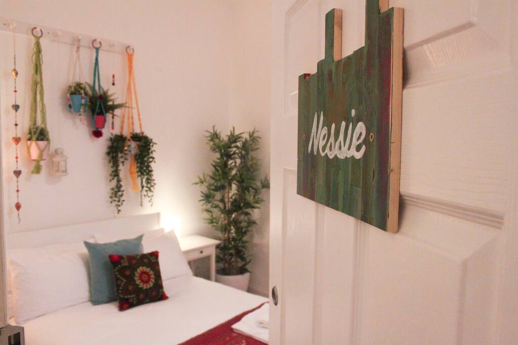Double bed in your private bedroom, colourful handmade decoration by Britt