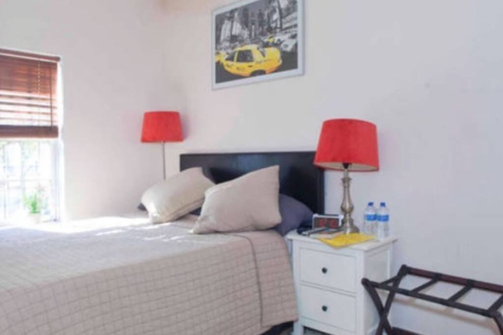 Bedroom with comfortable Queen-sized bed