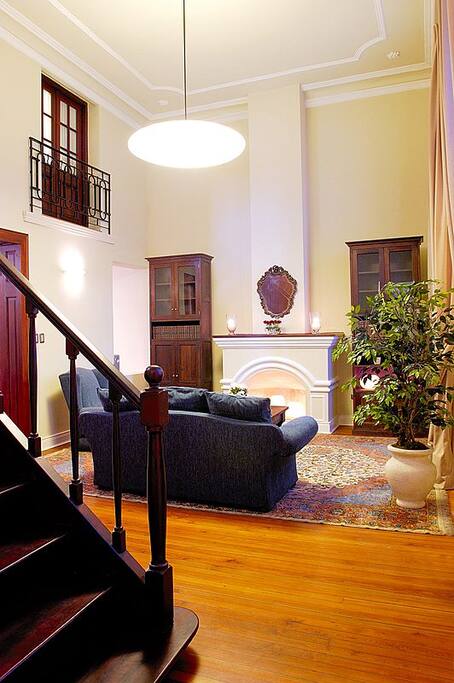 Soaring high ceiling greets guests as they enter the property.