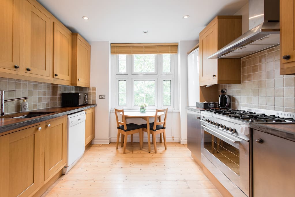 Separate kitchen with plenty of space to entertain, extendable dining to table.