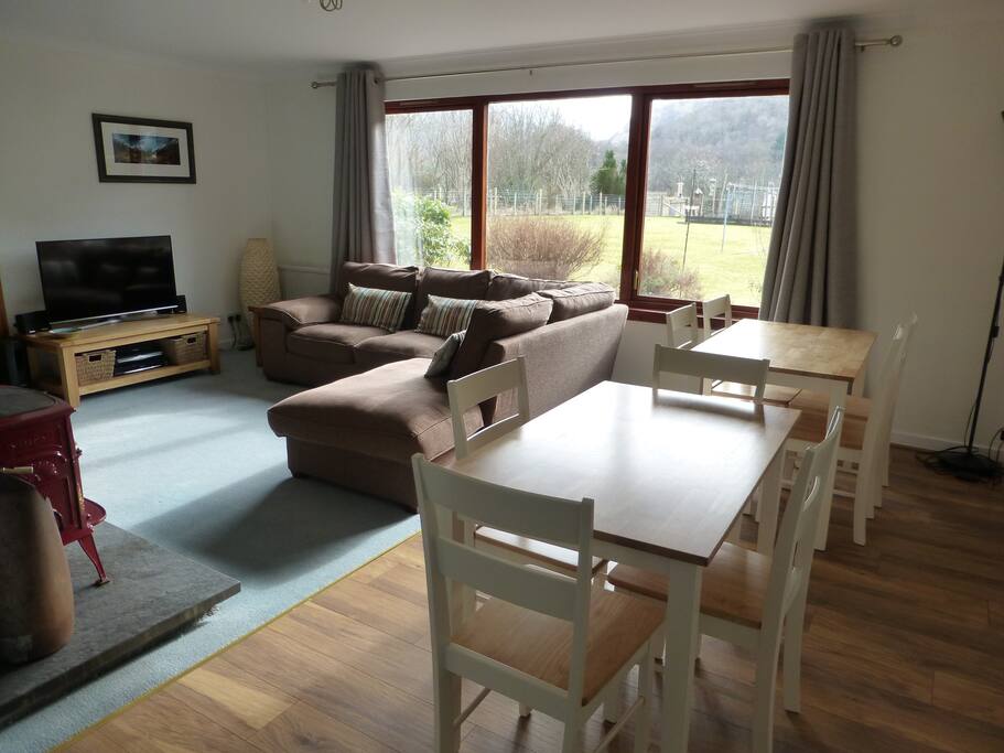 Dining and Lounge area looking out onto garden and the mountains beyond.
