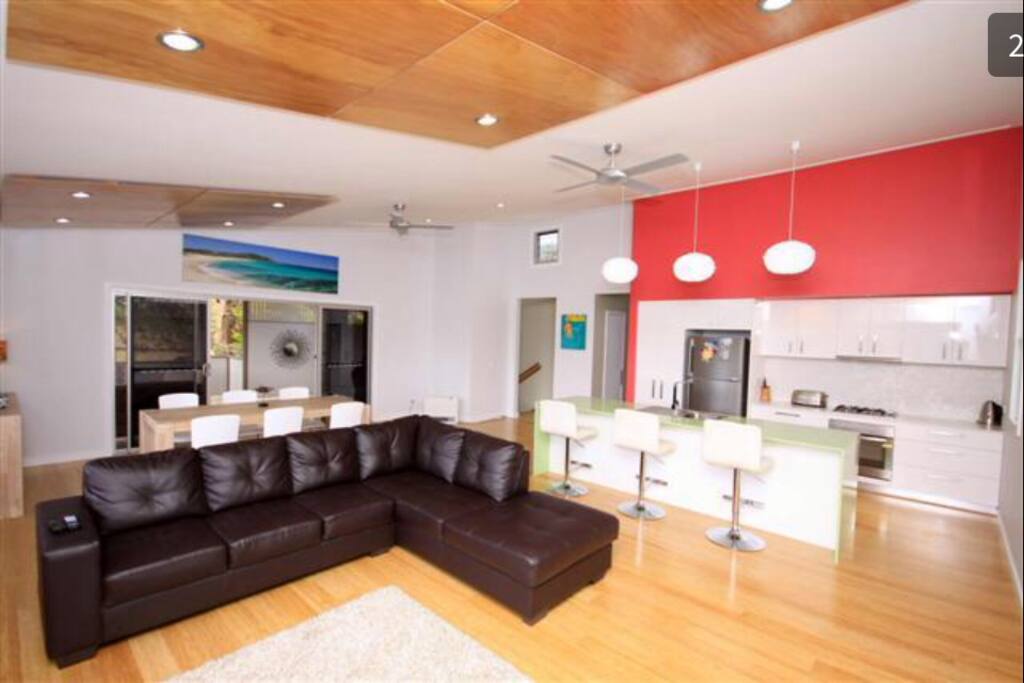 Space now has a 12 seater, 2.8m dining table and some kitchen renovations since this photo