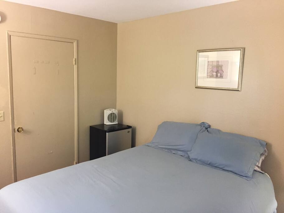 Small refrigerator and bed
