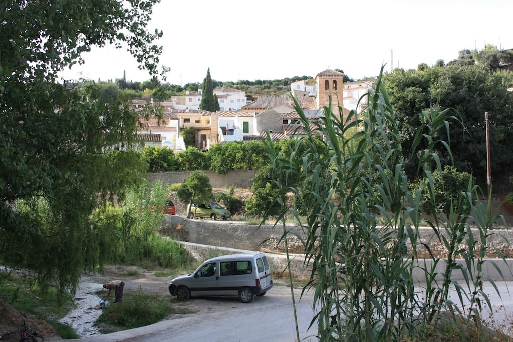 A three storey town house with pool in Saleres - overlooks an orange grove and small stream.