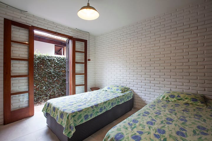 The room has: 1 single bed + 1 “3 in 1” bed. 
The 3-in-1 bed can be 1 single bed when closed and, when open, it can be 1 queen bed OR 1 single bed with 1 trundle bed