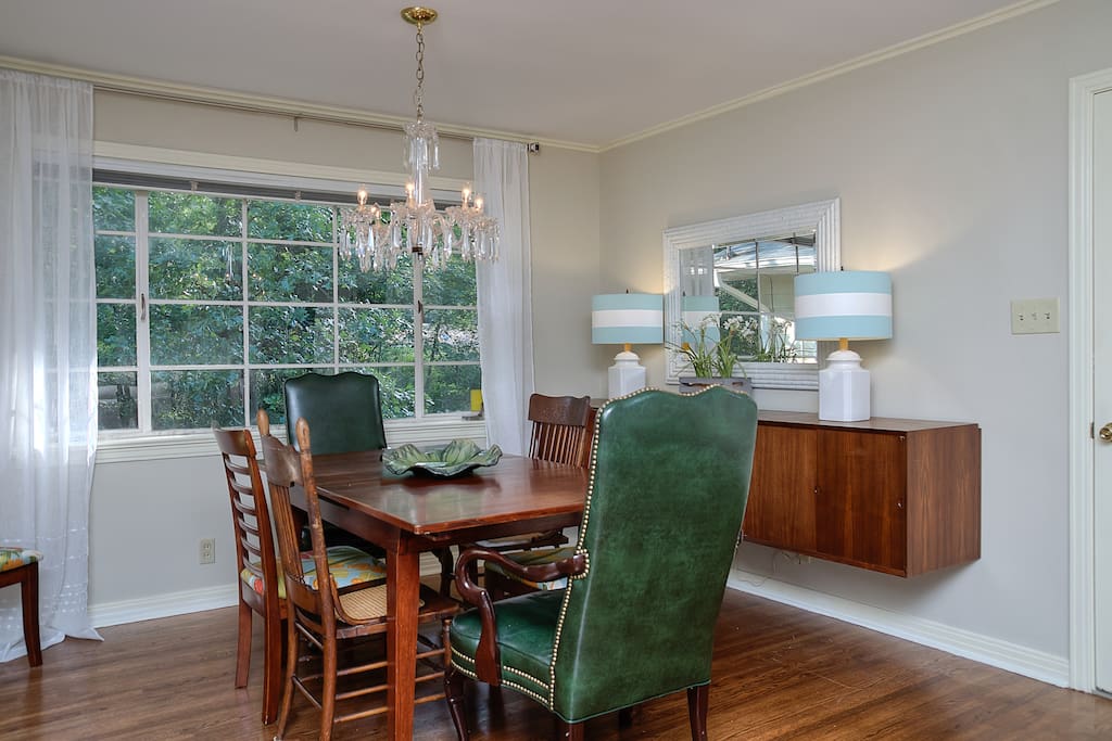 Dining room seats six with an additional three bar stools in kitchen