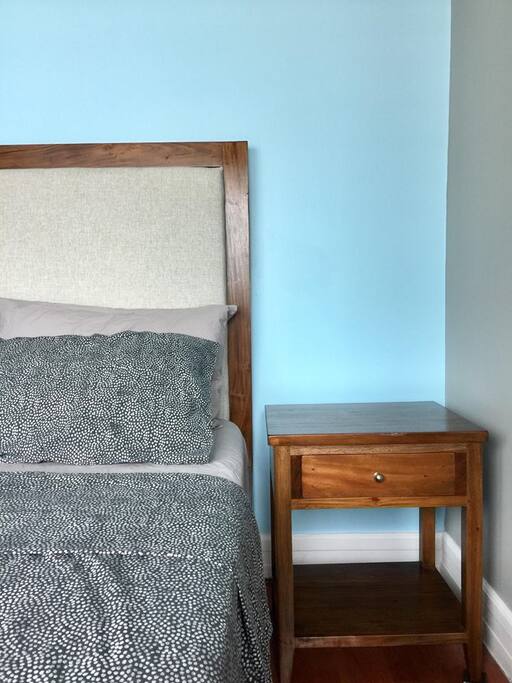 Bedroom with queen-sized comfortable bed & fresh linens for a good night's sleep.