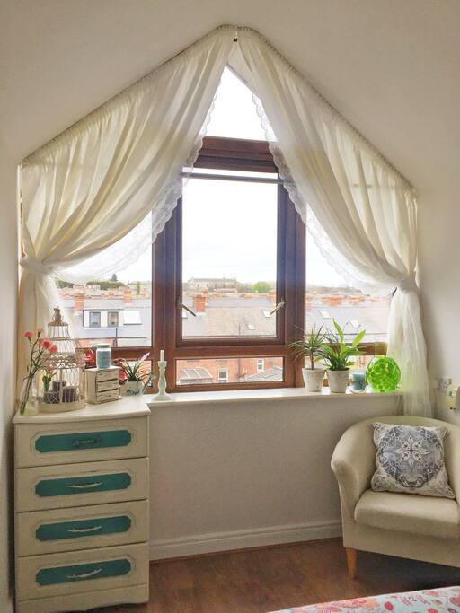 Big window and a comfy armchair