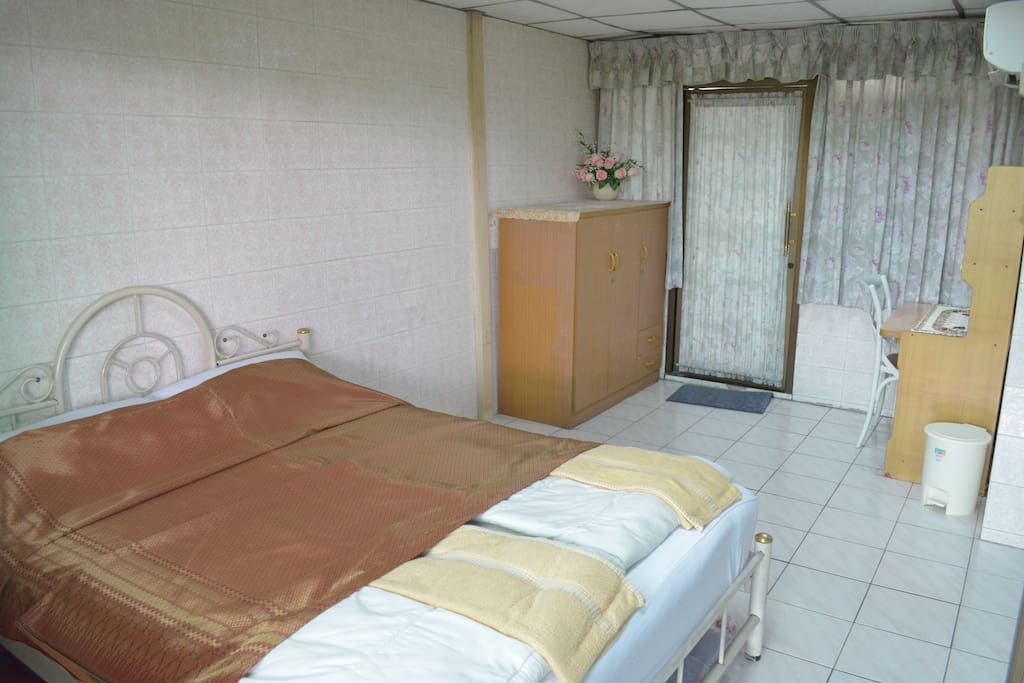 Queen Room with a little garden balcony.
