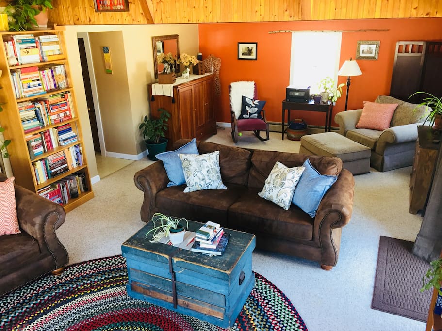 The living room and back sitting area allow plenty of options to sit and relax, read, or do yoga/meditate.