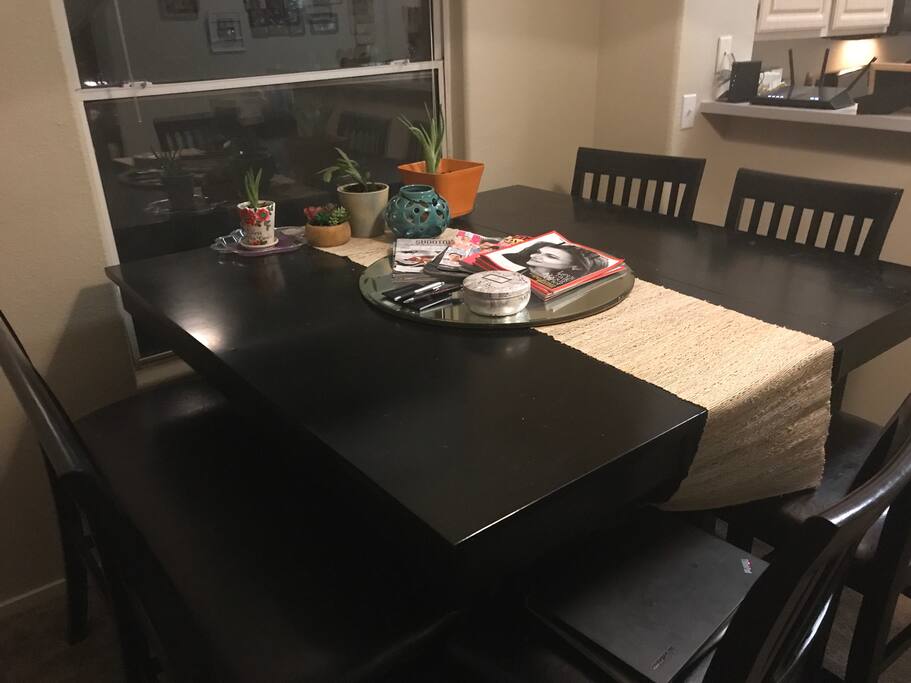 Ample dining/work space and an abundance of up to date magazines to relax with