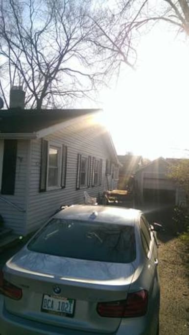 The driveway has enough parking space for 4 cars.