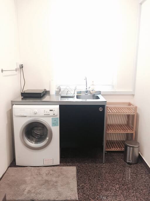 Fully functional kitchenette equipped with washer/dryer