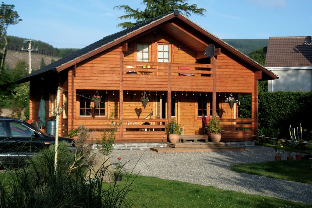 In the morning, the sun shines on the front of the house - decided to call the house Redwood.